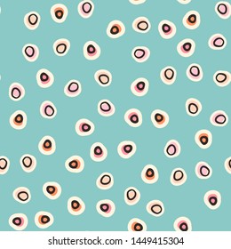Repeated hand-drawn round dots. Cute seamless pattern. Endless girly print