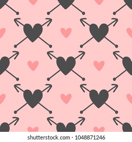 Repeated hearts with arrows. Cute seamless pattern. Drawn by hand. Romantic endless print. Vector illustration.