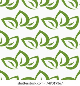 Repeated outlines of green leaves on white background. Seamless pattern. Vector illustration.