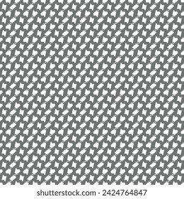 Repeated pattern composed of small irregular white shapes arranged alternately on a black backing. Textile design. Abstract vector.