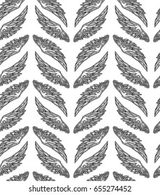 Repeated pattern. Seamless texture with beautiful black wings on a white background.  It can be used as wallpaper, printing, wrapping, fabric or background for your blog and your design. 