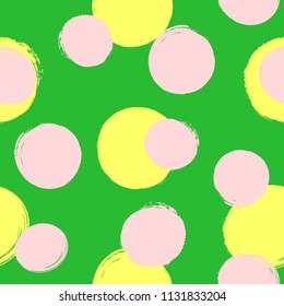 Repeated round spots painted by hand with rough brush. Coloured seamless pattern. Grunge, sketch, watercolor. Endless bright print. Vector illustration.
