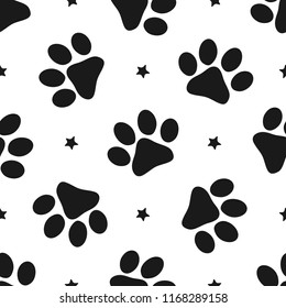 Repeated silhouettes of paw prints and stars. Seamless pattern for animals. Vector illustration.