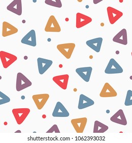 Repeated triangles and round dots. Geometric seamless pattern. Drawn by hand, sketch, doodle. Endless print for children. Trendy vector illustration.