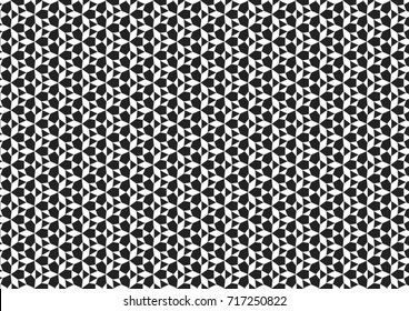 Repeating circular black and white geometric pattern with symmetrical layout, floral-like motifs and visual rhythm