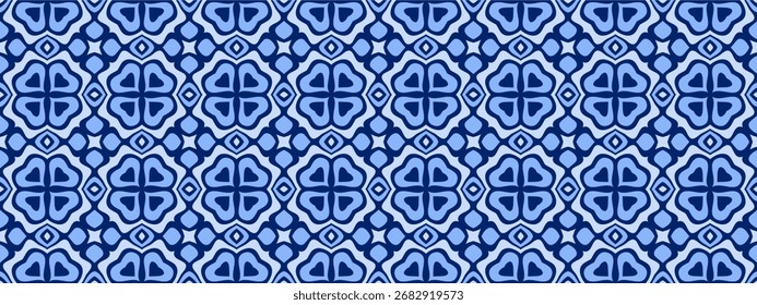 A repeating geometric pattern with intricate interlocking shapes in shades of blue.