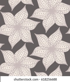 Repeating pattern with Abstract geometrical flower with pointy pedals with dots on gray.Seamless background with dots and wavy abstract geometrical flowers.