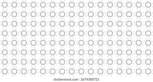 A repeating pattern composed of numerous small, detailed, circular shapes. The pattern is rendered in monochrome, with variations in shading and detail.