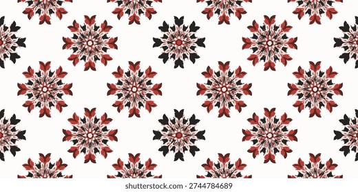 Repeating pattern of intricate red and black floral designs on a seamless background viewed from directly above