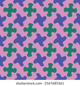 A repeating pattern of stylized puzzle pieces in shades of teal green and lavender blue on a pale pink background. Silhouette