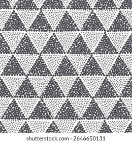 A repeating pattern of triangles filled with dotted textures in contrasting colors.