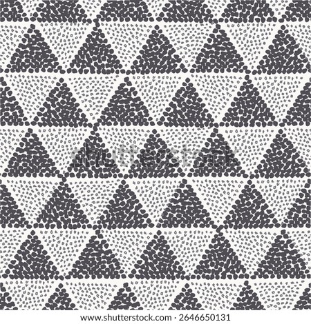 A repeating pattern of triangles filled with dotted textures in contrasting colors.