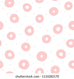 Repeating pink circles and round dots on white background. Cute geometric seamless pattern drawn by hand. Sketch, doodle. Endless girlish print. Girly vector illustration.