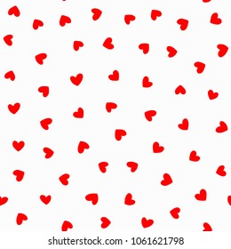 Repeating red hearts on white background. Romantic seamless pattern. Drawn by hand. Cute endless print. Vector illustration.