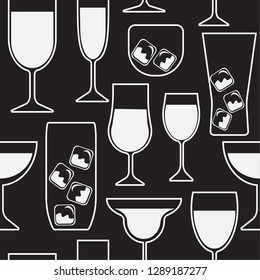 Repeating seamless pattern of cocktail, wine and spirit glasses with ice cubes in  white outlines and fill on black background