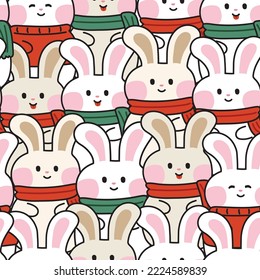 Repeat.Seamless pattern of cute rabbit wear scarf background.Smile face bunny.Animal character cartoon hand drawn.New year 2023.Christmas.Winter.Kawaii.Vector.Illustration.