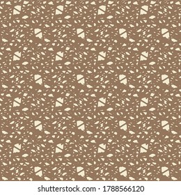 Repetitive pattern consisting of small patches of different shapes and sizes. Brown surface with white spots. Textile design.