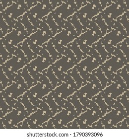 Repetitive pattern with small spots and a kind of spirals. Decorative graphics in shades of dark gray and beige.