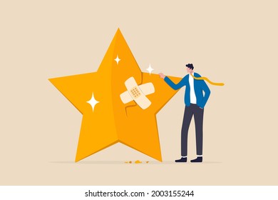 Reputation management, customer experience or rating, crisis management to repair or fix customer trust problem, credit score or satisfaction concept, businessman fix broken rating star with bandage.