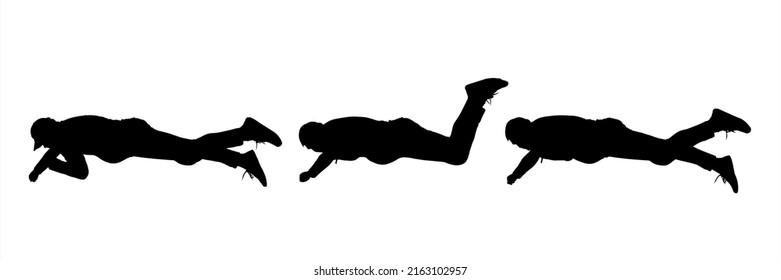 The rescuer tries to get something from below, stretches out his hand, and diligently rests his feet. A guy in a tracksuit and sneakers lies on his stomach. Three black silhouettes isolated on white