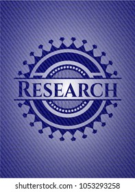 Research emblem with jean texture