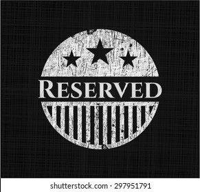 Emblema de tiza reservado escrito en una pizarra