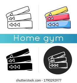 Resistance bands icon. Linear black and RGB color styles. Home gym equipment for fitness exercise. Sport gear for resistance training. Sportive elastic bands isolated vector illustrations