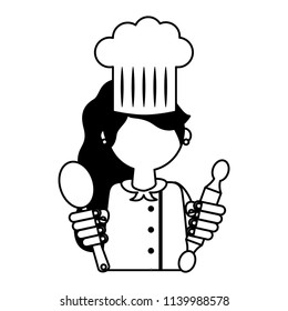 restaurant female chef with roller pin and spoon