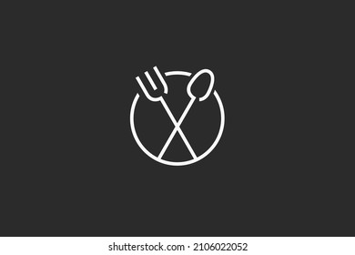 Restaurant fork and spoon in circle logo design