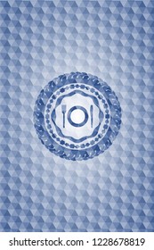 restaurant icon inside blue emblem with geometric pattern.
