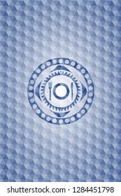 restaurant icon inside blue emblem with geometric pattern.