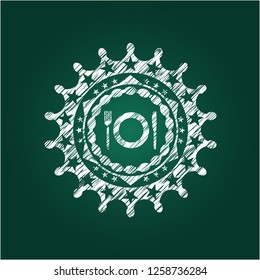 restaurant icon inside chalkboard emblem