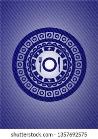restaurant icon inside emblem with jean background