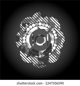 restaurant icon inside grey camo emblem