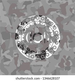 restaurant icon inside grey camouflage texture