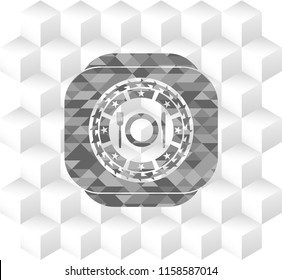 restaurant icon inside grey icon or emblem with geometric cube white background