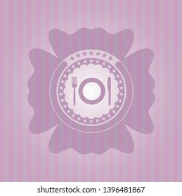 restaurant icon inside pink emblem