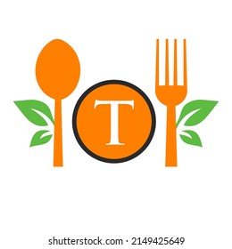 Restaurant Logo On Letter T Template. Spoon and Fork, Leaf Symbol for Kitchen Sign, Cafe Icon, Restaurant, Cooking Business Vector