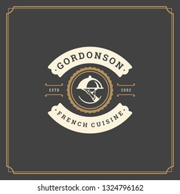 Restaurant logo template vector illustration. Waiter hand holding tray silhouette, good for restaurant menu and cafe badge. Vintage typography emblem design.