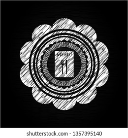 restaurant menu icon inside chalk emblem written on a blackboard