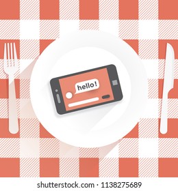 Restaurant table with knife and fork and plate with mobile phone with hello message internet web page on screen. Idea - unusual concept of modern social networking, virtual life, online chats