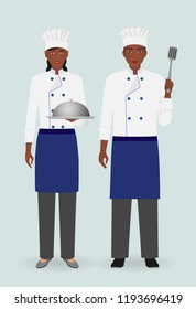 Restaurant team concept. Cooking food characters. Couple of male and female chefs standing together with utensil on a light background. Vector illustration.