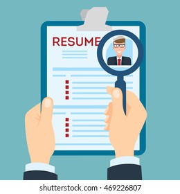 Resume with magnifier at the table. Cv resume concept. Finding a worker. Apply for a job. Business opportunity. Cv profile.