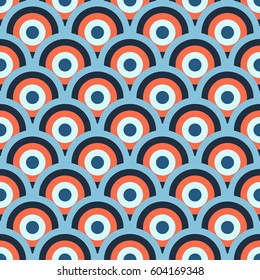 Retro 60-s geometric seamless pattern with blue and orange circles and waves. Vector illustration for background, wrapping paper, textile print, wallpaper, package, greeting card.