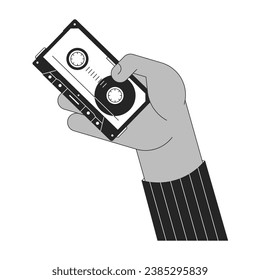 Retro 80s cassette holding cartoon human hand outline illustration. Vintage audio tape 2D isolated black and white vector image. 90s audiocassette magnetic flat monochromatic drawing clip art