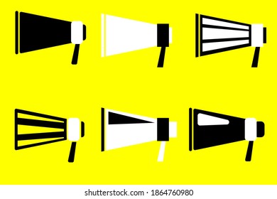 Retro abstract set of loudspeaker horns ony ellow background. Retro microphone icon. Stock image.
