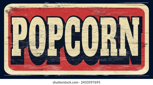 Retro aged popcorn sign on wood