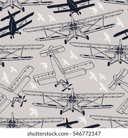 Retro airplanes with birds. Vector seamless pattern