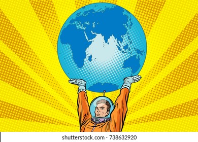 Retro astronaut is holding the planet Earth. Pop art retro vector illustration