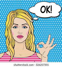 Retro blonde girl says OK pop art comics style. Vector woman showing OK gesture.